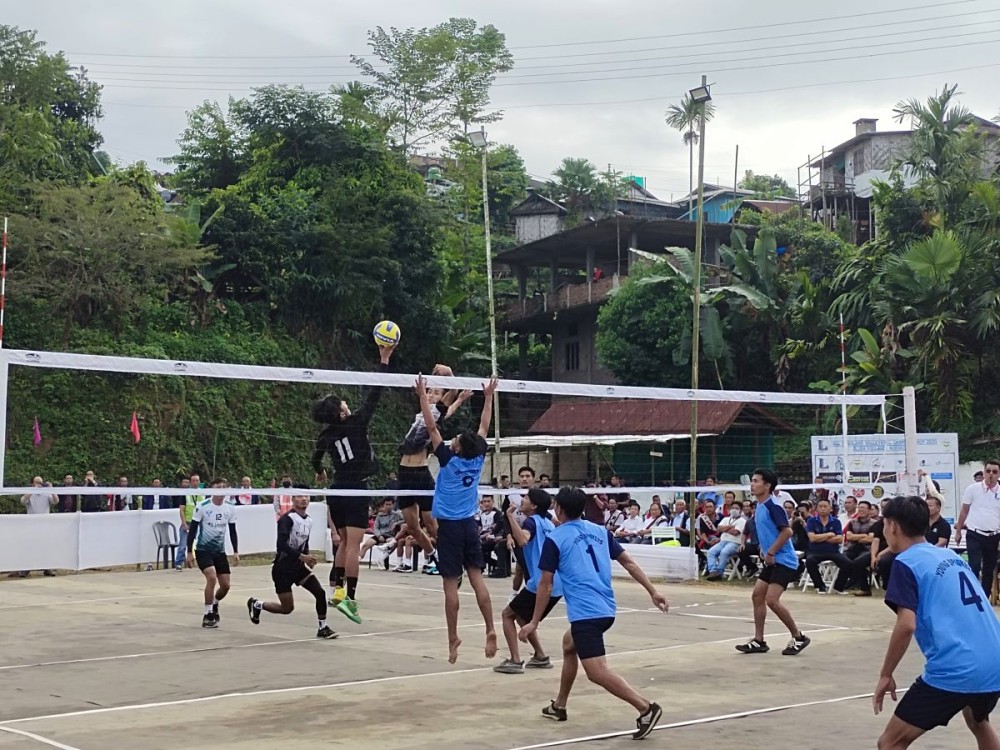 Changtongya Volleyball Association (in black) and Fabled United Dimapur (in blue) during the opening match of the All Nagaland Volleyball Championship 2025 at Aliba village on Tuesday. (Morung Photo)