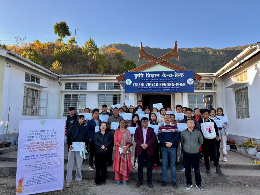 Dignitaries with participants of training prog on “Empowering Rural Livelihood through Scientific Backyard Poultry Management” at KVK Phek.