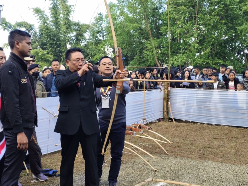 Chief Guest Moatoshi Longkumer, MLA, formally inaugurating the first archery event during the second day of the 10th Walu Aten of the Khensa Students’ Union at Khensa village on December 29.