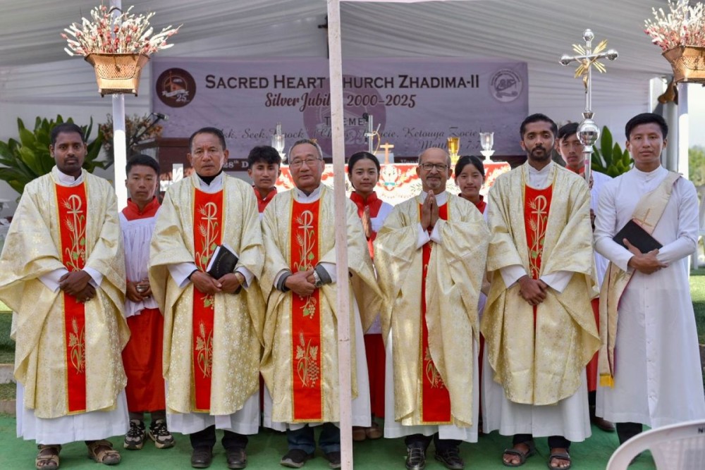 Rev Fr Neisalhou Carolus, Rev Fr Alex Vizo and others at the silver jubilee celebration of Sacred Heart Church, Zhadima-II on December 28.