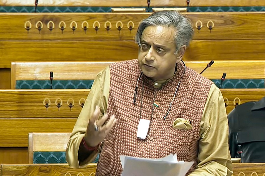 Congress MP Shashi Tharoor speaks in the Lok Sabha during the Winter Session of Parliament in New Delhi on Wednesday, December 17, 2025. (Photo: IANS/Video Grab/Sansad TV)