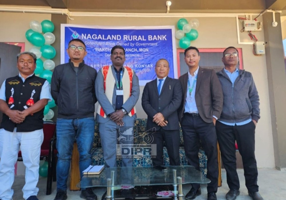 W Chingang with officials at the dedication programme of the Nagaland Rural Bank (NRB), Wakching Branch on December 13. (DIPR Photo)