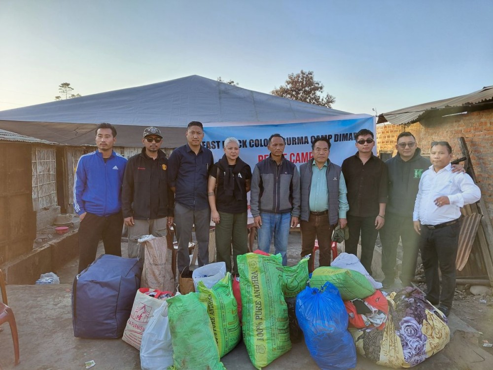 Officials of NPYF and NPWF distributes aid to the fire-affected families in Burma Camp, Dimapur on December 15.