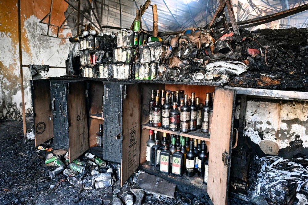 The charred interior of Romeo Lane restaurant and nightclub after a fire, triggered by a cylinder blast, destroyed everything inside at Arpora in North Goa district on December 7, 2025. (IANS Photo)