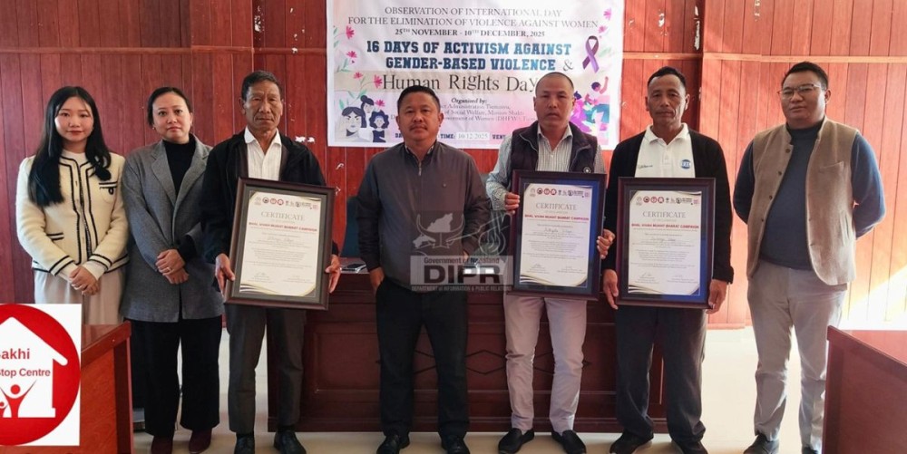 DC Tseminyu, Japheth Woch and officials with recipients of certificate of declaration of child marriage free villages at an event held at DC's conference hall, Tseminyu on December 10.  (DIPR Photo)