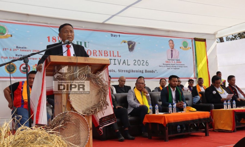 Minister for Environment, Forest & Climate Change and Village Guards, CL John addressees the inaugural day of the 18th Bishu Mini Hornbill Tribal Festival 2026 at Dhansiripar, Chümoukedima, on January 27. (DIPR Photo)