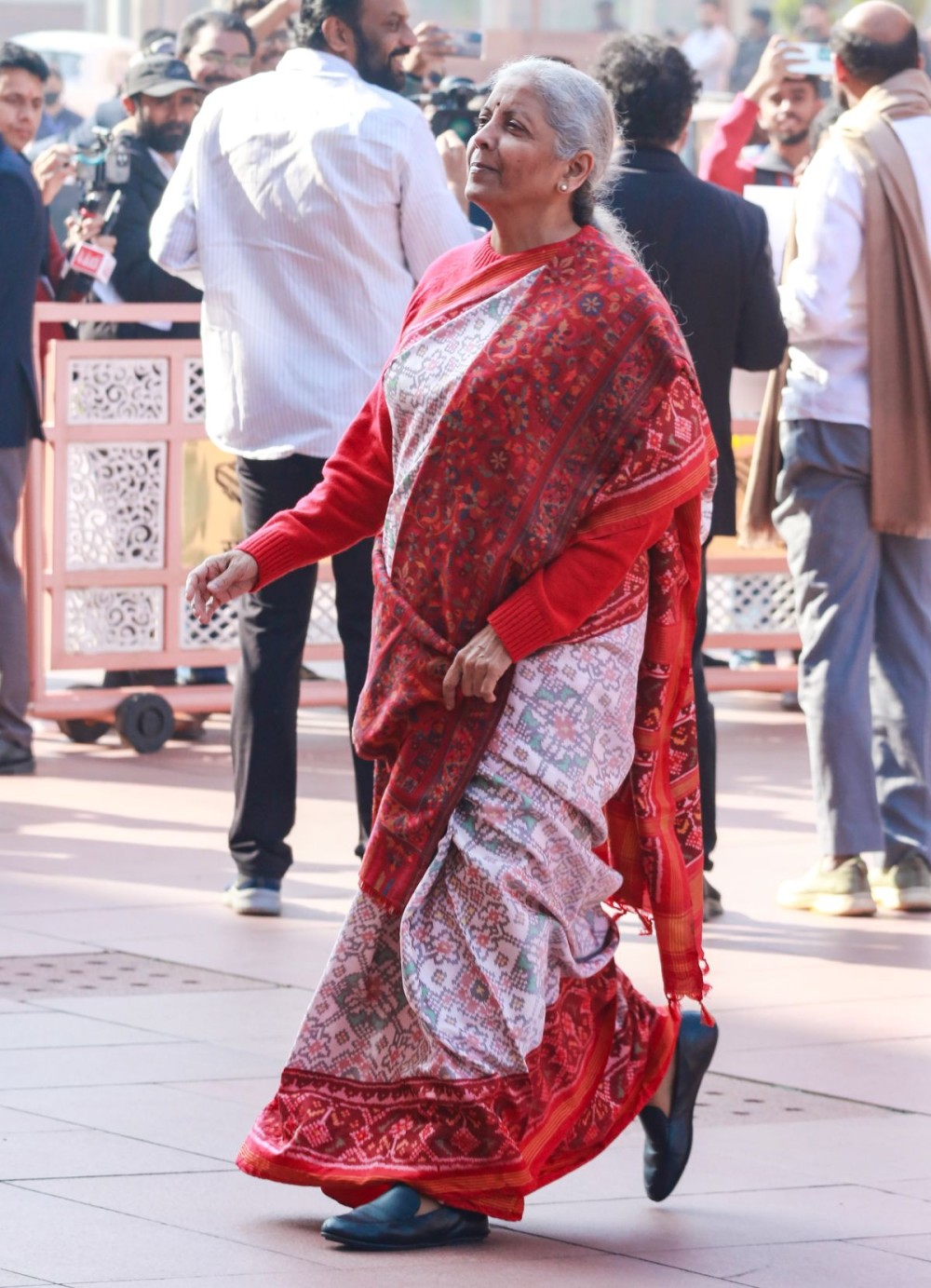 Union Finance Minister Nirmala Sitharaman at the Parliament House premises during the Winter Session of Parliament in New Delhi on Tuesday, December 16, 2025. (Photo: IANS/Qamar Sibtain)