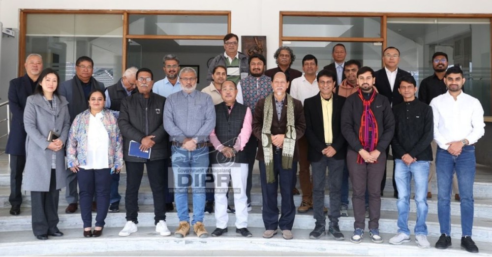 CM Rio along with other officials and media team from Gujarat pose for a photo at the CMR Complex in Kohima on January 21. (DIPR Photo)