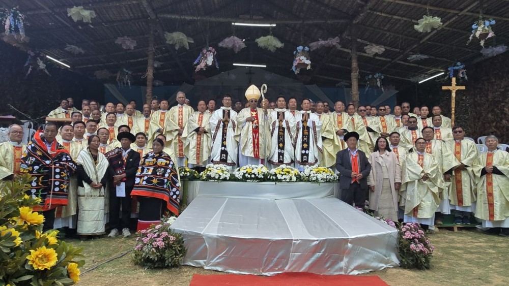 Most Rev Dr James Thoppil, Bishop of Kohima (2nd from L) with the newly ordained priests, Ngonyi John Dukru, SJ, David Zholia, and Avi Abraham Krocha, SJ during their priestly ordination seen with their families and priests at St. Ignatius Parish Razeba on January 7.