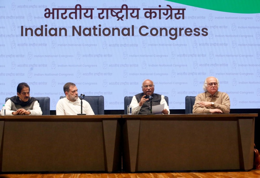 Congress President Mallikarjun Kharge addresses a press conference as LoP in the Lok Sabha, and party leader Rahul Gandhi, Congress MP Jairam Ramesh, and AICC General Secretary (Organization) KC Venugopal look on at Indira Bhawan, in New Delhi, Saturday, December 27, 2025. (IANS File Photo)