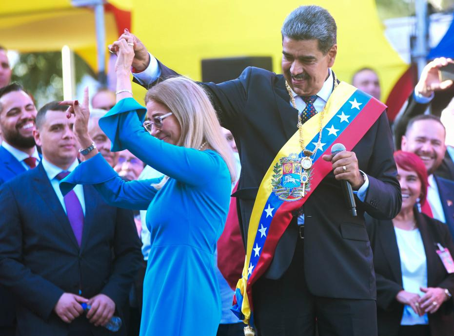 Nicolas Maduro dances with his wife Cilia Flores during a celebration rally after he was sworn in as Venezuelan President for a third term in Caracas, Venezuela, January 10, 2025. (IANS File Photo)