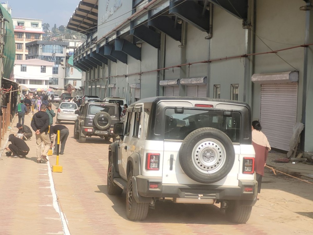 Vehicles plying over bypass road adjacent to Khuochiezie ground in Kohima. (Morung Photo)