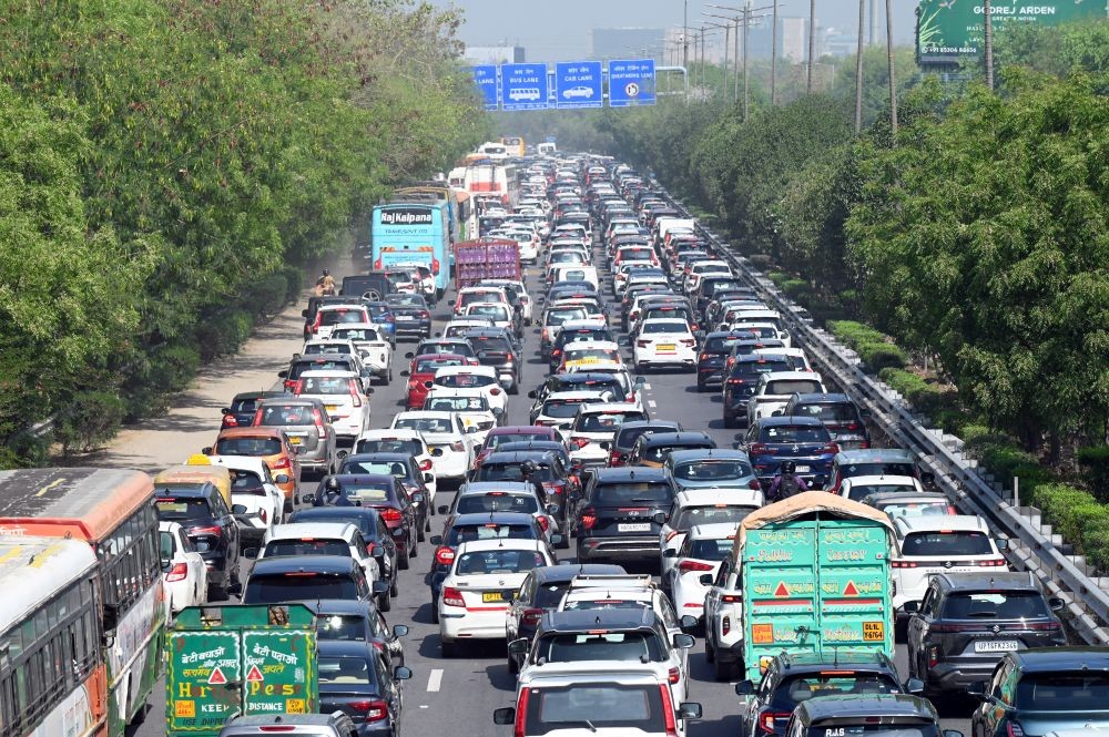 A massive traffic jam is seen on the Delhi-bound carriageway of the Noida-Greater Noida Expressway following a protest by workers, causing disruption for several hours in Noida on April 13. (IANS File Photo)