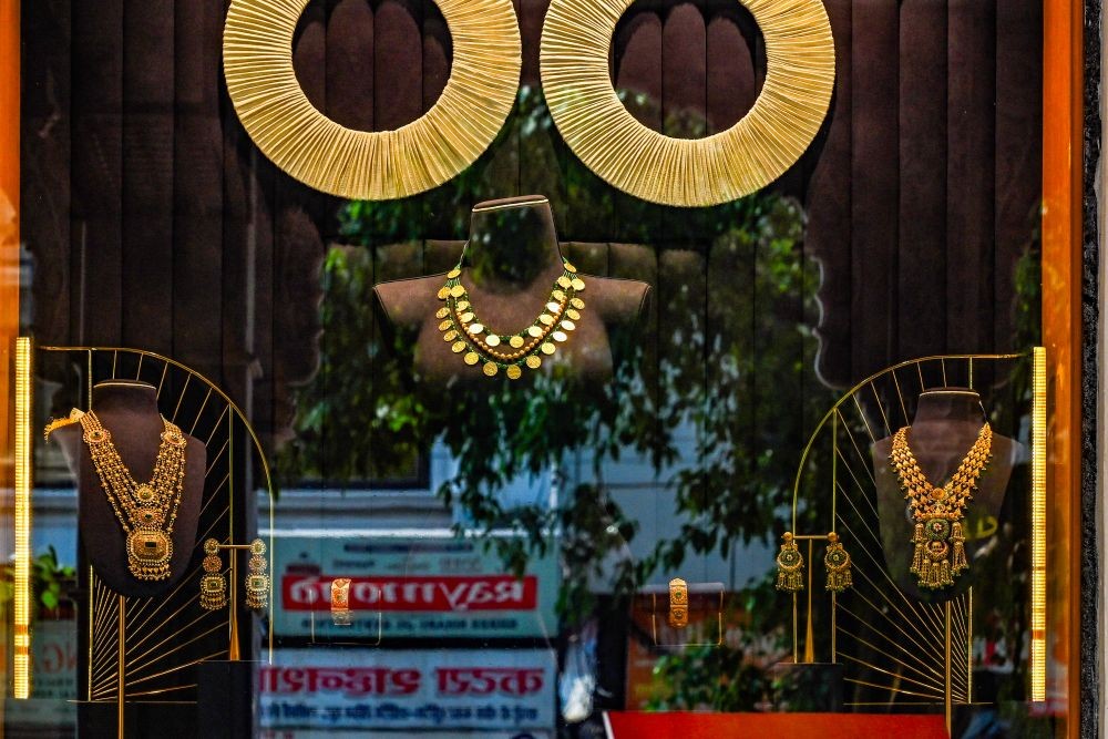 Gold jewellery displayed at a jewellery shop as traders witness low footfall amid reduced consumer spending and a slowdown in non-essential purchases following Prime Minister Narendra Modi’s appeal to limit gold buying for a year to help conserve foreign exchange reserves, in New Delhi on May 13, 2026. (IANS File Photo)