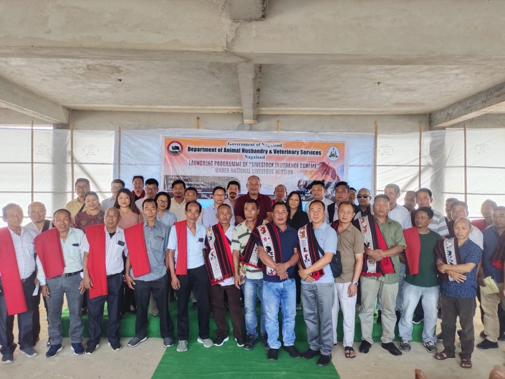 Officials of AH & VS Department, Advisor Temjenmenba, village leaders, farmers and beneficiaries at the launching programme of the Livestock Insurance Scheme for 29 Jangpetkong Assembly Constituency at Khar Village Council Hall on May 9. (Morung Photo)