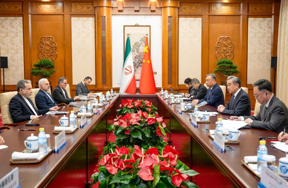 Chinese Foreign Minister Wang Yi, also a member of the Political Bureau of the Communist Party of China Central Committee, holds talks with Iranian Foreign Minister Seyyed Abbas Araghchi in Beijing, capital of China, on May 06, 2026. (Xinhua via IANS Photo)