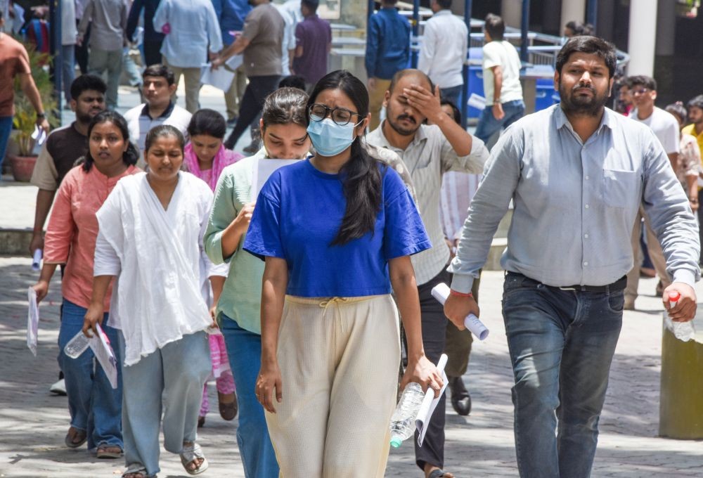 Aspirants come out after appearing for the UPSC Civil Services Preliminary Examination at National PG College in Lucknow on May 24, 2026. (IANS Photo)
