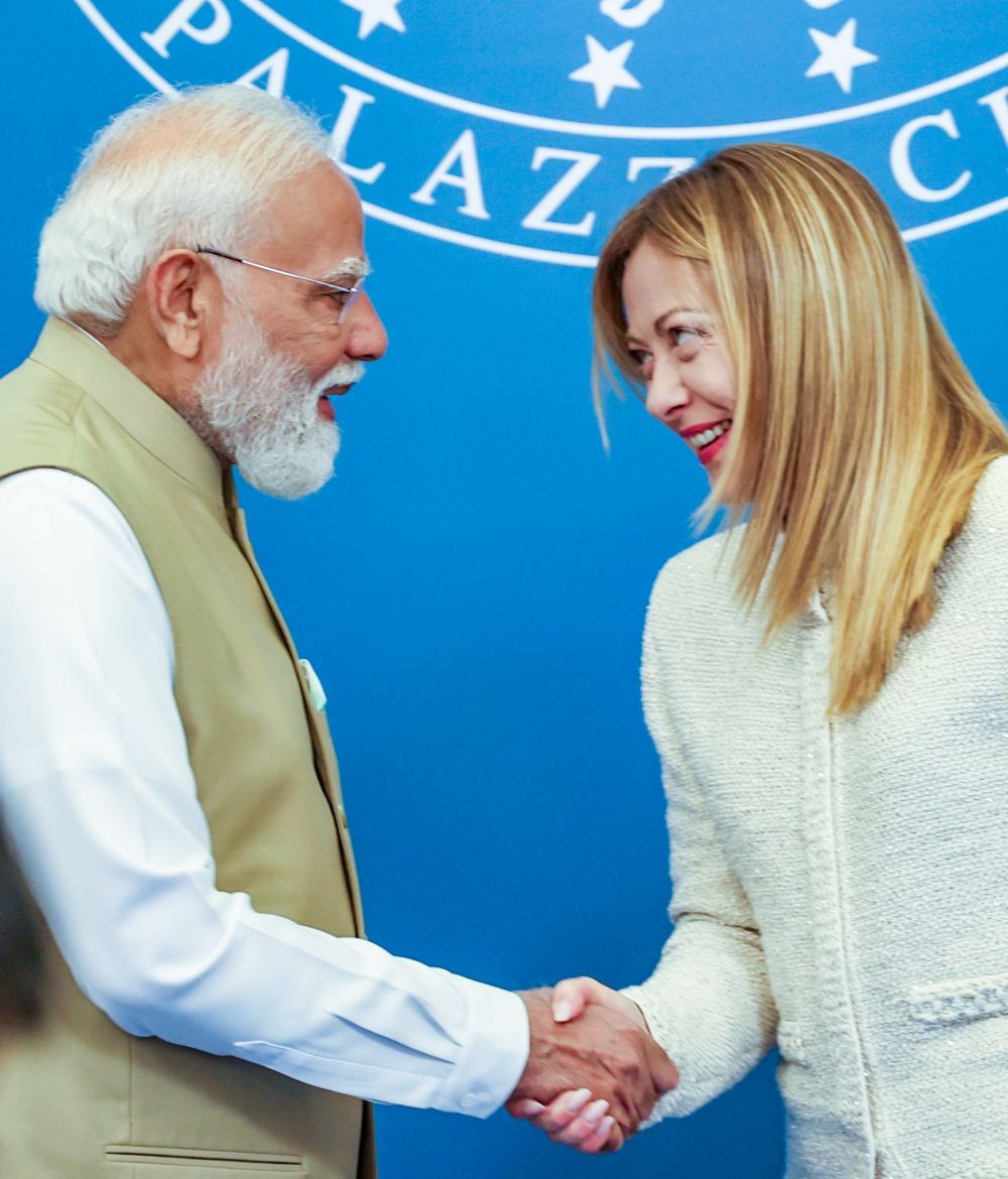 Prime Minister Narendra Modi exchanges a handshake with Italian Prime Minister Giorgia Meloni during a press statement, in Rome, Italy on May 20, 2026. (IANS/PMO Photo)