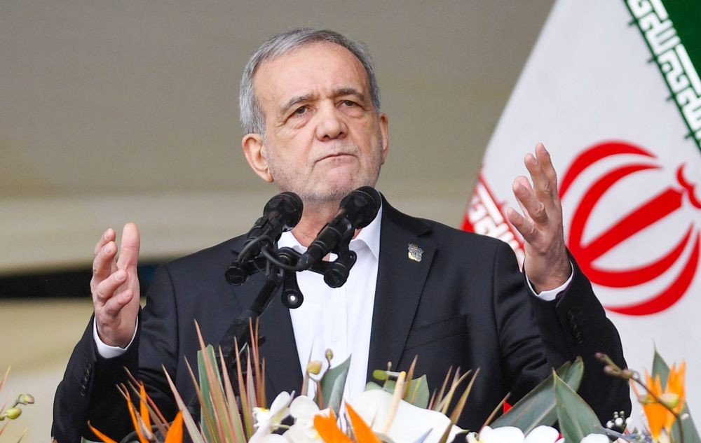 This file photo shows Iranian President Masoud Pezeshkian delivering a speech in Tehran, Iran, Feb. 11, 2026. Iranian President Masoud Pezeshkian, head of judiciary, and one jurist of the Guardian Council to temporarily assume duties of leadership in Iran after Supreme Leader Khamenei's death. (IANS File Photo)