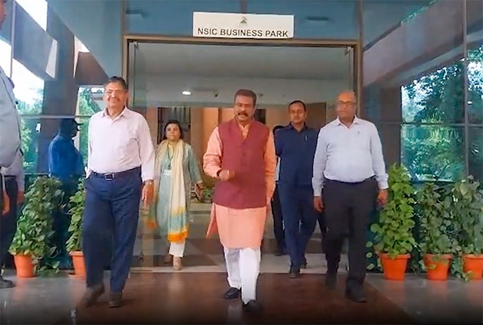 Union Education Minister Dharmendra Pradhan leaves the National Testing Agency (NTA) headquarters after reviewing security and logistical arrangements for the NEET-UG re-examination in New Delhi on June 09, 2026. (IANS/Video Grab Photo)
