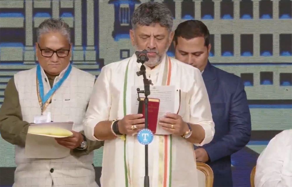 D.K. Shivakumar takes the oath as Chief Minister of Karnataka during a ceremony at Lok Bhavan in Bengaluru on June 3. (IANS/Video Grab Photo)