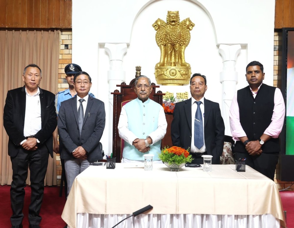 Nagaland Governor Nand Kishore, Chief Secretary Sentiyanger Imchen and others during the swearing-in of Er Tiameren Walling, Chairman-cum-Member of the NERC at Lok Bhavan, Kohima on June 16. (Photo Courtesy:  PRO Lok Bhavan, Kohima)
