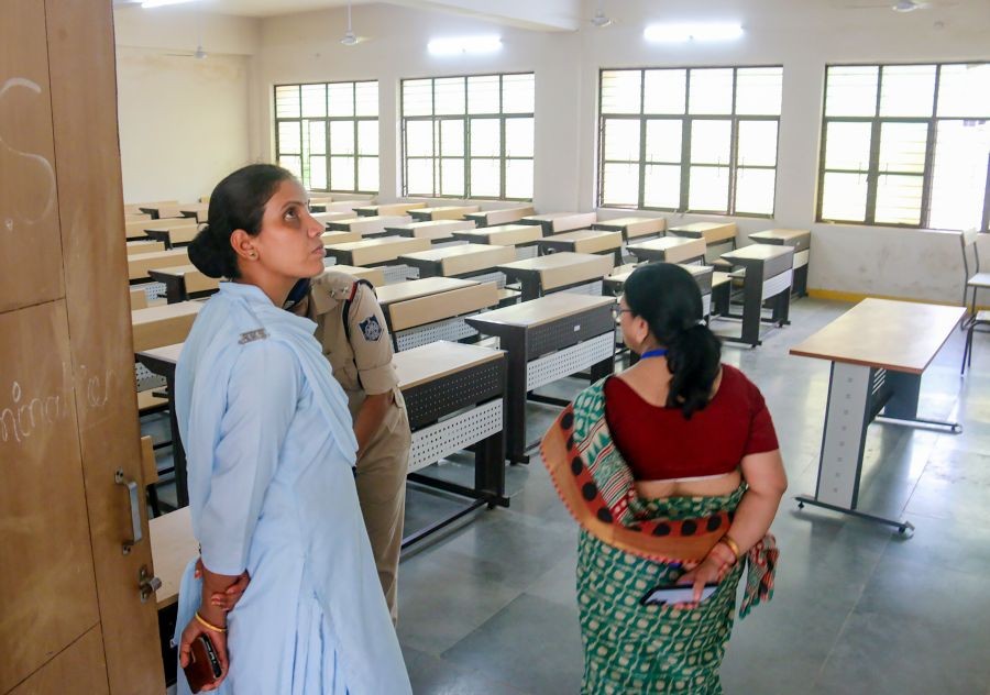 Police and security personnel deployed at the NEET examination centre as part of security arrangements ahead of the exam in Bhopal, Madhya Pradesh, on June 20, 2026. (IANS Photo)