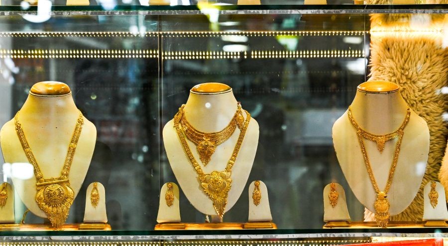 Gold jewellery displayed at a jewellery shop. (IANS File Photo)