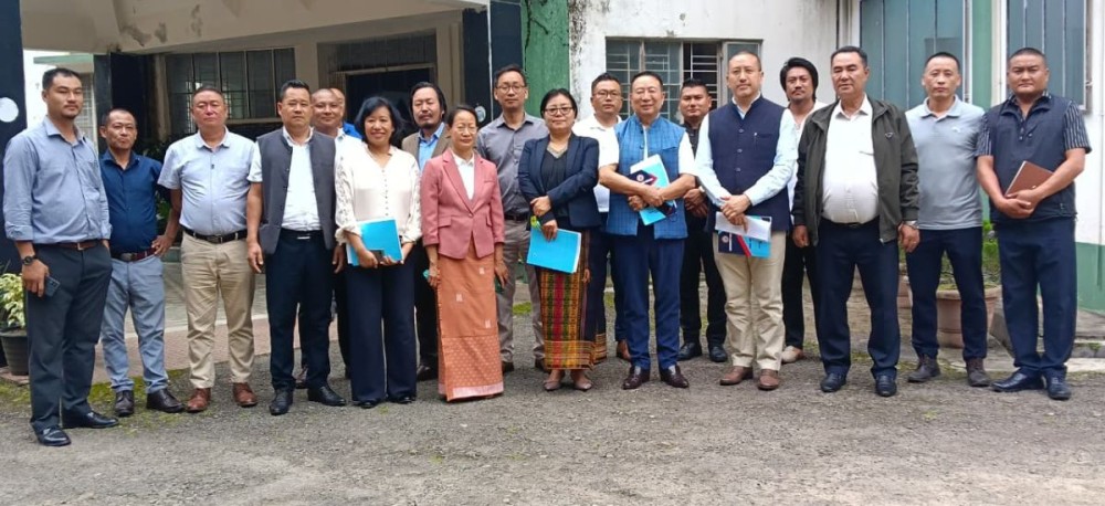 Kuzholuzo (Azo) Nienu with others during introductory meeting in Kohima on June 11.