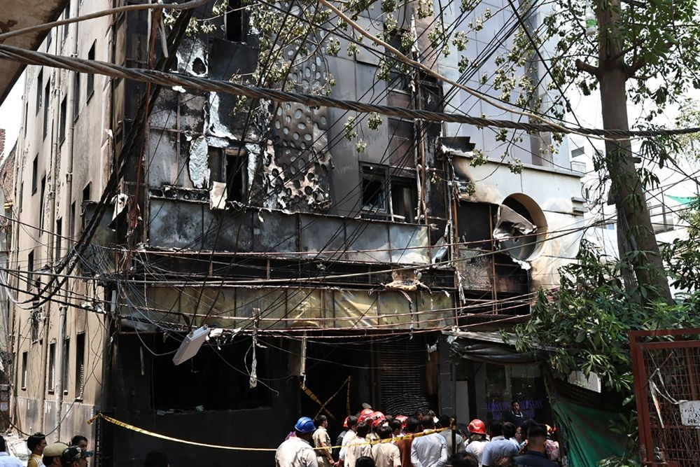 Charred remains of a devastating fire in a multi-storey building housing a hotel and a restaurant in Malviya Nagar, New Delhi, on June 3, 2026. At least 21 people were killed and several others injured in the incident. (IANS Photo)