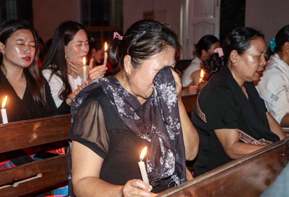 People participate in a candlelight vigil at the Manipur Baptist Convention (MBC) to honour six Laingmai Naga civilians who were abducted, held hostage since May and later found killed, in Imphal on Sunday, June 14, 2026. (IANS File Photo)