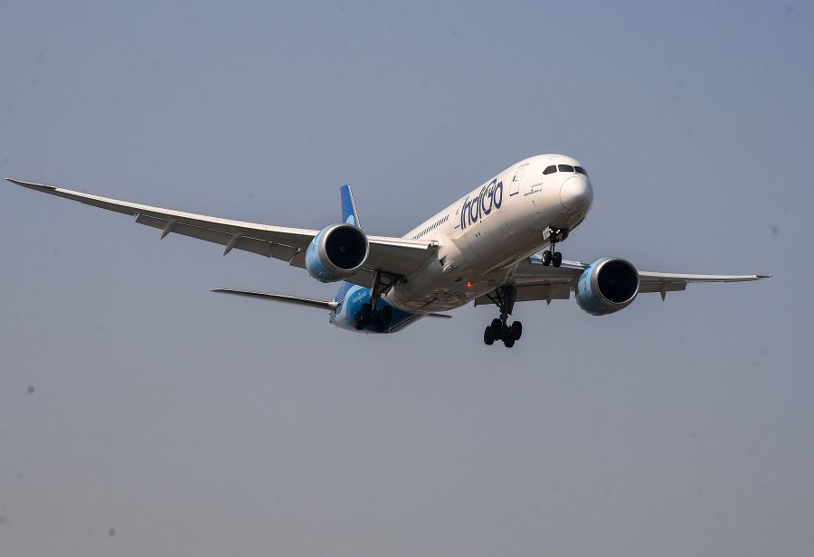 An Indigo Airlines plane flies amid cancellations and delays affecting several Indigo flights, in Mumbai on December 5, 2025. (IANS File Photo)