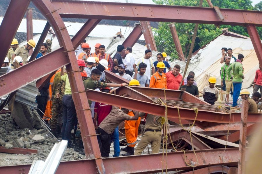 Rescue personnel carry out operations after the roof of an under-construction warehouse collapsed in the Taratala area of Kolkata on June 24, 2026. Several people were feared trapped under the debris as emergency teams launched rescue efforts at the site. (IANS Photo)