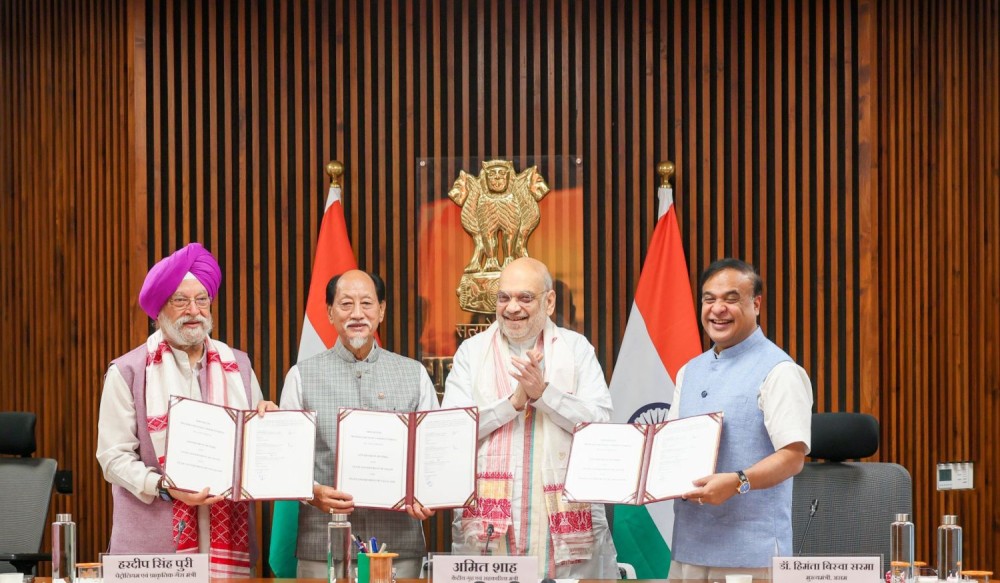 Union Home Minister Amit Shah and Union Petroleum and Natural Gas Minister Hardeep Singh Puri with Nagaland Chief Minister Dr Neiphiu Rio and Assam Chief Minister Himanta Biswa Sarma during the signing of a tripartite MoU on ‘Mineral Oil Operations in the Assam-Nagaland Boundary Areas’ in New Delhi on June 11. (PIB File Photo)