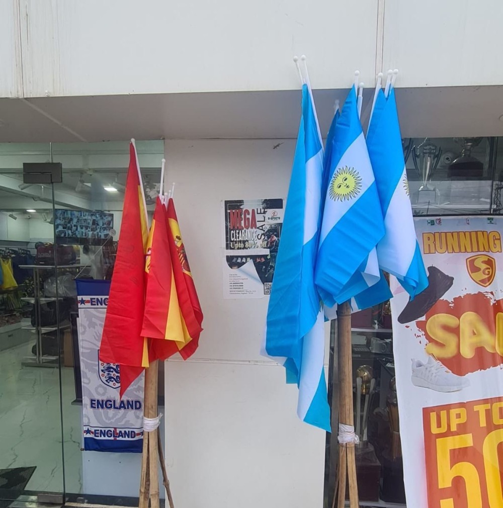 The Spanish and Argentine flags are seen outside a shop in Chümoukedima on July 18, the penultimate day of the 2026 FIFA World Cup. (Morung Photo)