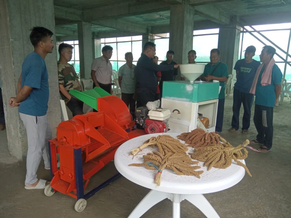 Farmers receive a demonstration on the operation of the newly commissioned machines during the inauguration of modern millet threshing and milling machines at Kezoma village on July 14. (Morung Photo)