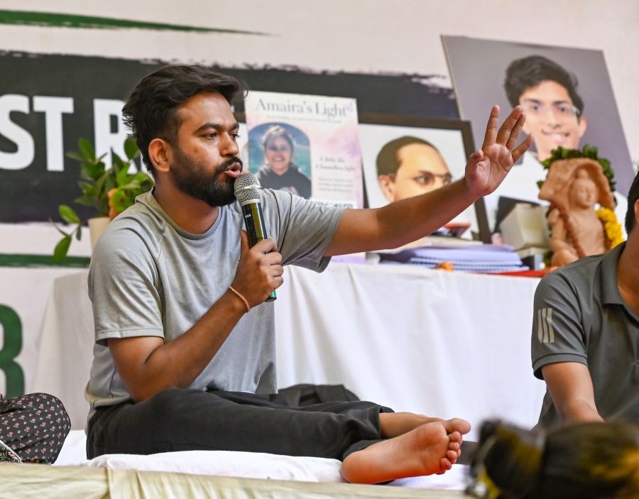 Cockroach Janta Party (CJP) founder Abhijeet Dipke addresses supporters during the ongoing protest demanding the resignation of Union Education Minister Dharmendra Pradhan over alleged examination irregularities and the NEET paper leak at Jantar Mantar in New Delhi on July 19, 2026. (IANS Photo)