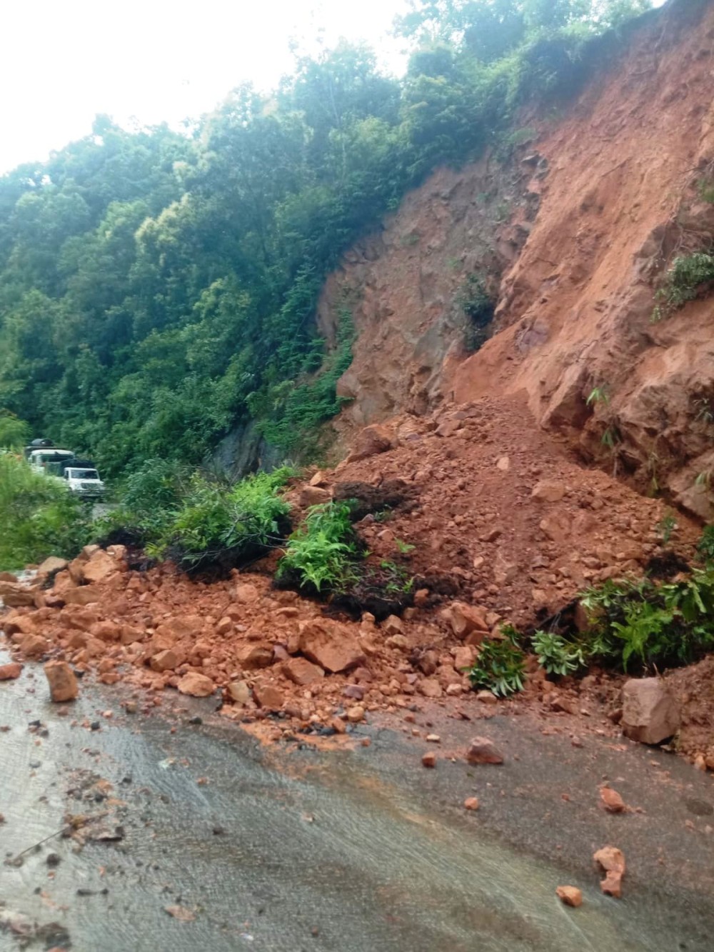 A road blocked by mudslide in Wokha district on July 30.