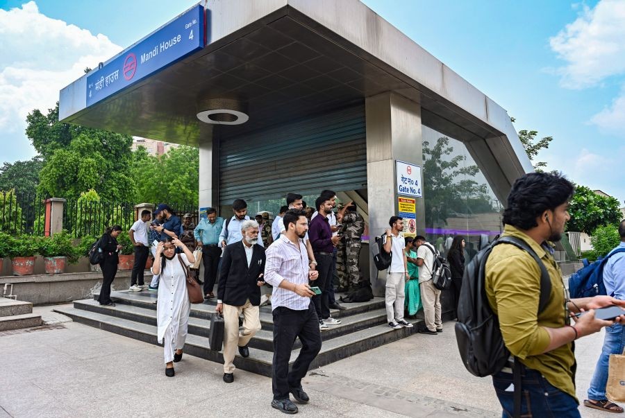 Commuters at Mandi House Metro station after 16 Delhi Metro stations are closed due to security reasons amid heightened security in the national capital on July 22, 2026. (IANS Photo)