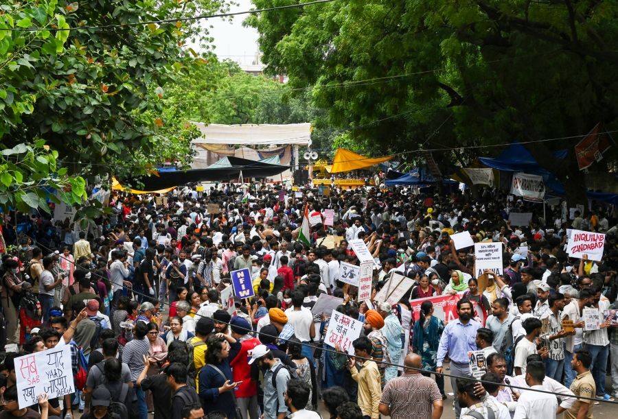 Protesters gather at Jantar Mantar during the Cockroach Janata Party’s  protest demanding the resignation of Union Education Minister Dharmendra Pradhan over alleged examination irregularities at Jantar Mantar in New Delhi on July 23, 2026. (IANS Photor)