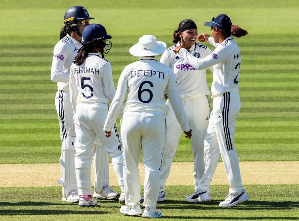 London: India's Sneh Rana celebrates with teammates after taking the wicket of England's Amy Jones during the one-off Test match between India Women and England Women at Lord's Cricket Ground, in London, England, on Monday, July 13, 2026. (Photo: IANS/X/@BCCIWomen)