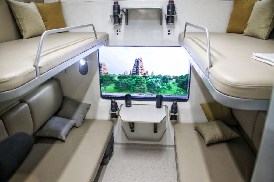 The first AC coach design of the Vande Bharat Sleeper train by Kinet Railway Solutions is displayed during the International Railway Equipment Exhibition (IREE) 2025 at Bharat Mandapam, Pragati Maidan, in New Delh. (IANS File Photo)