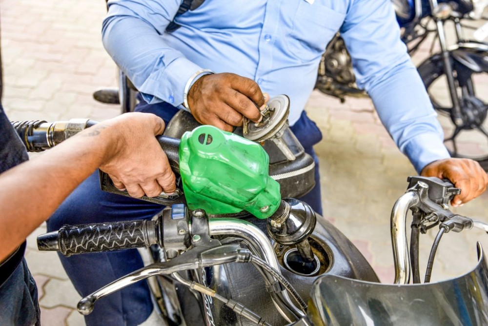 Amritsar: A customer refuels his motorcycle at a petrol pump after petrol and diesel prices were hiked for the second time within a week, in Amritsar on Tuesday, May 19, 2026. (Photo: IANS)