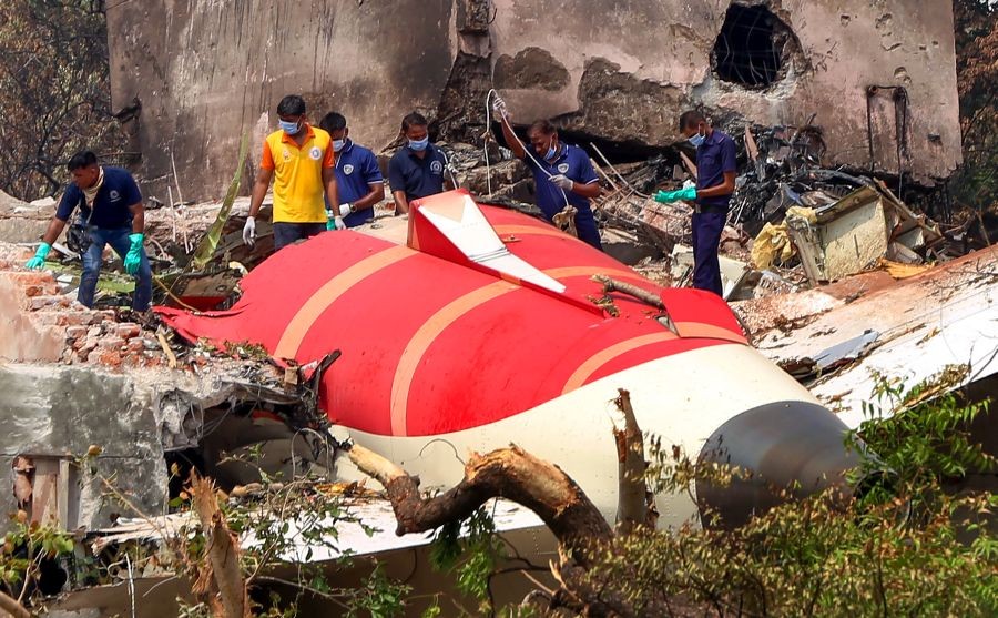 Efforts underway to remove the wreckage of the ill-fated Air India flight 171 that crashed and fell on the hostel mess of BJ Medical College, in Ahmedabad. (IANS Photo)