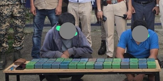 Manipur: Five militants and two drug peddlers held, cache of arms and drugs seized. (IANS Photo)