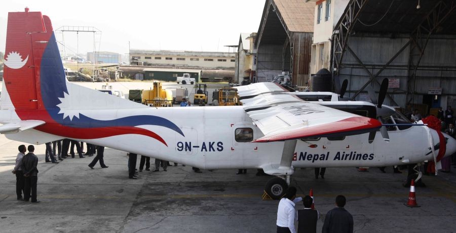 Chinese made aircraft Y12-E as a new plane for Nepal Airlines Corporation (NAC) lands at Tribhuvan International Airport in Kathmandu, Nepal, Nov. 3, 2014. (IANS File Photo)