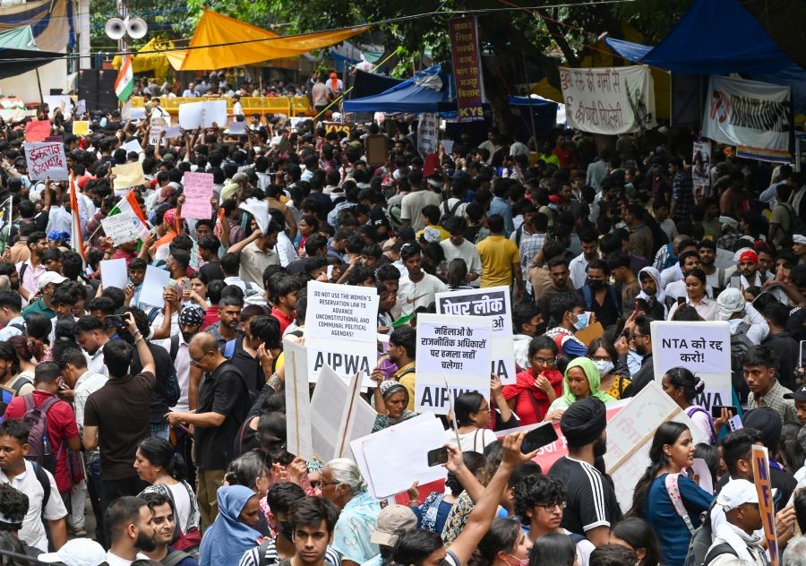 Supporters of the Cockroach Janata Party hold placards and raise slogans during a protest demanding the resignation of Union Education Minister Dharmendra Pradhan over alleged examination irregularities at Jantar Mantar in New Delhi on July 23, 2026. (IANS Photo)
