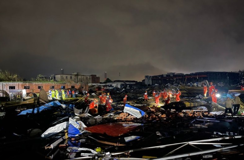 Rescuers are seen in operation at an area hit by thunderstorms and gales in Huangzhou District, Huanggang City, central China's Hubei Province, on July 7, 2026. (Photo by Chen Shuai/Xinhua/IANS)