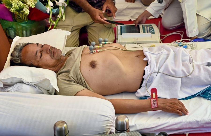 Climate activist Sonam Wangchuk receives medical attention during his indefinite hunger strike at a protest organised by the Cockroach Janata Party (CJP), demanding the resignation of Union Education Minister Dharmendra Pradhan over alleged irregularities in the NEET examination, at Jantar Mantar in New Delhi on July 15, 2026. Wangchuk has been on an indefinite hunger strike for the past 18 days. (IANS Photo)