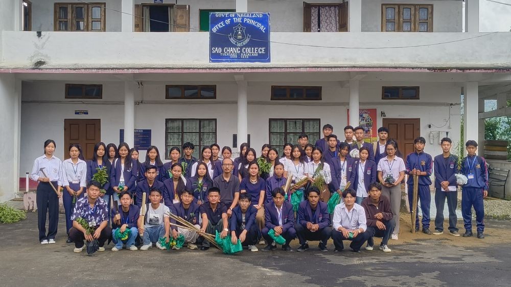 Students pose for a group photo after a plantation drive held at Sao Chang College in Tuensang on July 29.